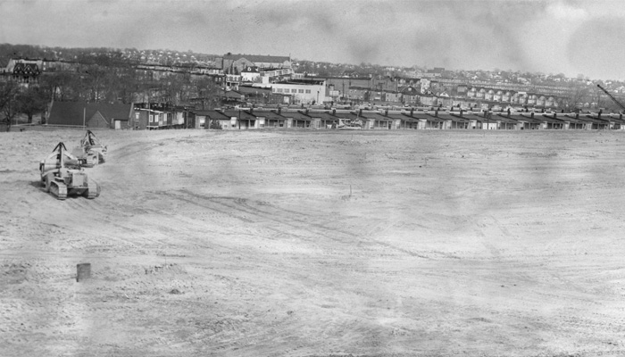 Historic black-and-white photograph of the cleared Laurel Cemetery site being prepared for construction of the Two Guys Department Store, now Belair-Edison Crossing Shopping Center.