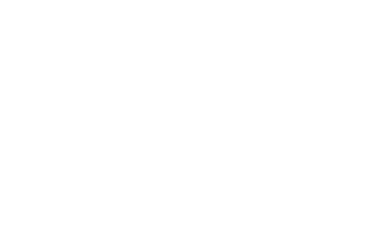 A white architectural etching depicting the historic entrance gate to Laurel Cemetery. The symmetrical structure consists of two square, two-story gatehouses connected by a large pointed Gothic archway at the center. Each gatehouse features decorative rooflines, multiple-paned windows, and tall vertical openings that frame the central passage. Trees and shrubs are visible through the archway and along the sides of the entrance, with a narrow pathway leading beneath the arch into the cemetery grounds. The detailed crosshatch illustration emphasizes the building's historic architecture and the formal entrance to the cemetery.